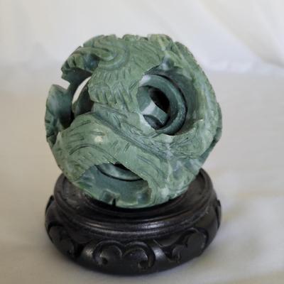 Carved Puzzle Ball and Foo Dogs (D-EL)