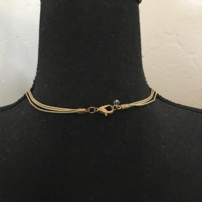 Beautiful gold tone plate, Napier long fashion necklace