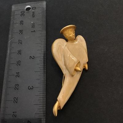 Gold tone enamel angel brooch