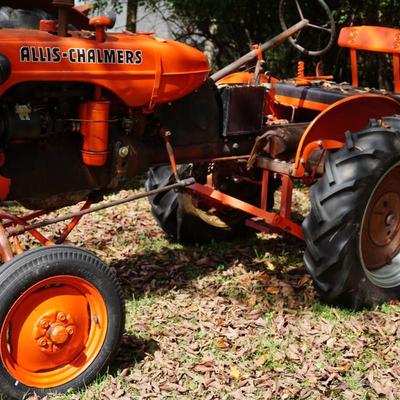 Sale Photo Thumbnail #41: working. 
comes with plow. (see photo) 
Information was copied   off of the tractor
AMS274
B66077
2H3
12-13 
AM 2990-5 
Please note winning bid is subject to personal reps' approval. see terms of auction