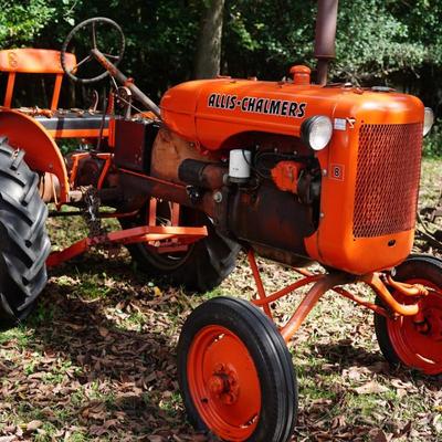 Sale Photo Thumbnail #37: working. 
comes with plow. (see photo) 
Information was copied   off of the tractor
AMS274
B66077
2H3
12-13 
AM 2990-5 
Please note winning bid is subject to personal reps' approval. see terms of auction