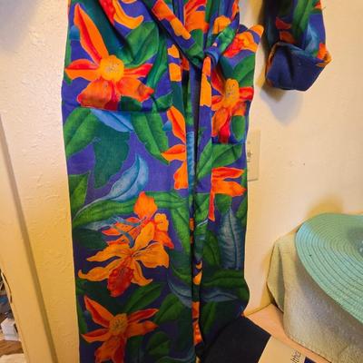 Two swin suits - sun hat - water shoes - and a robe