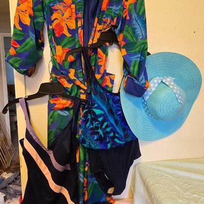 Two swin suits - sun hat - water shoes - and a robe