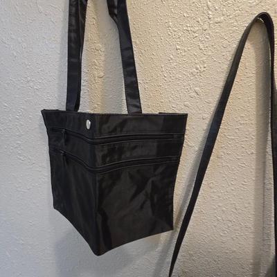 Four black purses