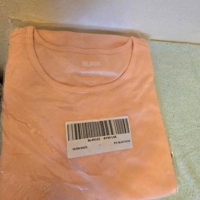 Brand new clothes with tags - shirts and slacks
