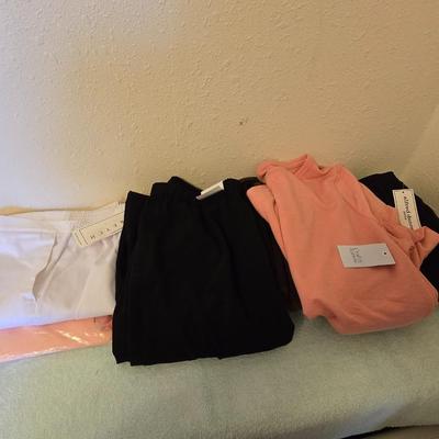 Brand new clothes with tags - shirts and slacks