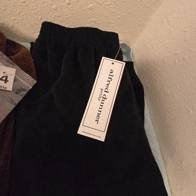 Brand new clothes with tags - shirts and slacks