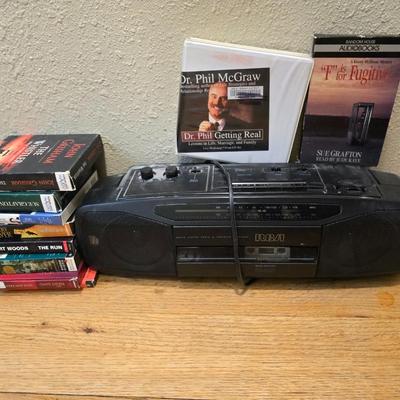 RCA Dual cassette deck am/fm radio with assortment of books on tape