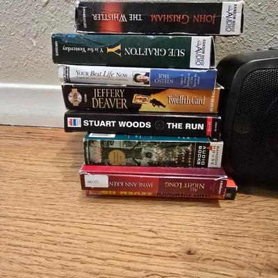 RCA Dual cassette deck am/fm radio with assortment of books on tape