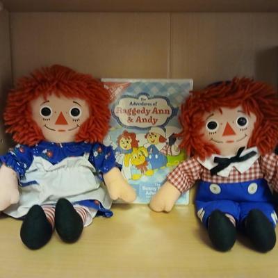 Raggedy Ann & Andy dolls and DVD movie with a discovery kids aquarium and a pair of funny glasses