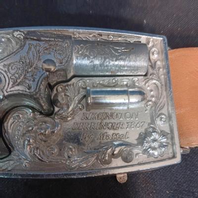 MATTEL FANNER SHOOTIN' SHELL TOY GUN W/SHELLS, LEATHER BELT HOLSTER AND TOY REMINGTON DERRINGER IN BELT BUCKLE