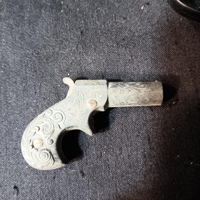 EDISON TOY CAP GUN MADE IN ITALY AND A VERY OLD DIE CAST TOY GUN