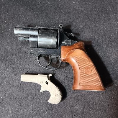 EDISON TOY CAP GUN MADE IN ITALY AND A VERY OLD DIE CAST TOY GUN