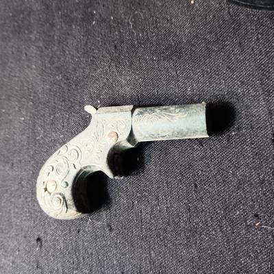 EDISON TOY CAP GUN MADE IN ITALY AND A VERY OLD DIE CAST TOY GUN
