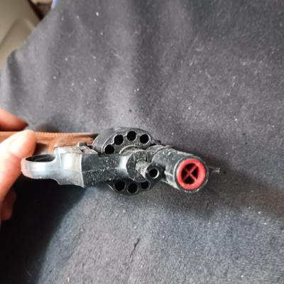 EDISON TOY CAP GUN MADE IN ITALY AND A VERY OLD DIE CAST TOY GUN