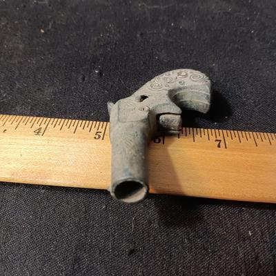 EDISON TOY CAP GUN MADE IN ITALY AND A VERY OLD DIE CAST TOY GUN