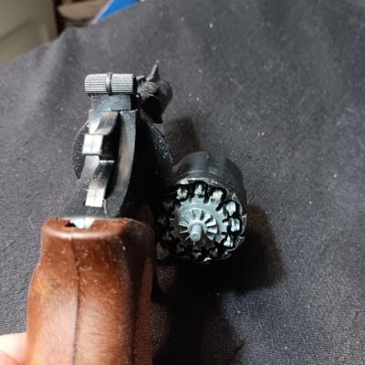 EDISON TOY CAP GUN MADE IN ITALY AND A VERY OLD DIE CAST TOY GUN