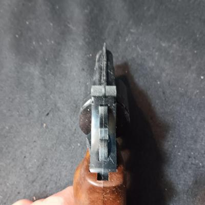 EDISON TOY CAP GUN MADE IN ITALY AND A VERY OLD DIE CAST TOY GUN