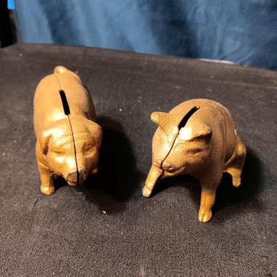 2 BRASS COLORED CAST IRON PIGGY BANKS