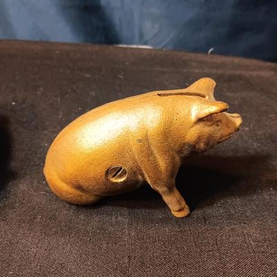 2 BRASS COLORED CAST IRON PIGGY BANKS