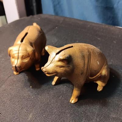 2 BRASS COLORED CAST IRON PIGGY BANKS