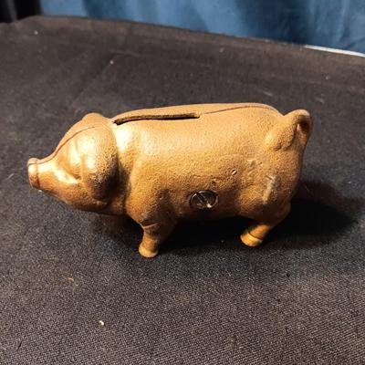 2 BRASS COLORED CAST IRON PIGGY BANKS