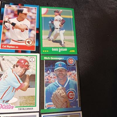 A VARIETY OF SPORTS TRADING CARDS