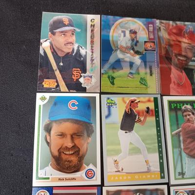 A VARIETY OF SPORTS TRADING CARDS