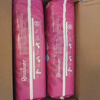 Brand new box of four 33 count latex free Reassure flex shape pads - 132 total in unopened bags