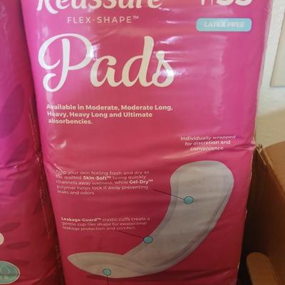 Brand new box of four 33 count latex free Reassure flex shape pads - 132 total in unopened bags