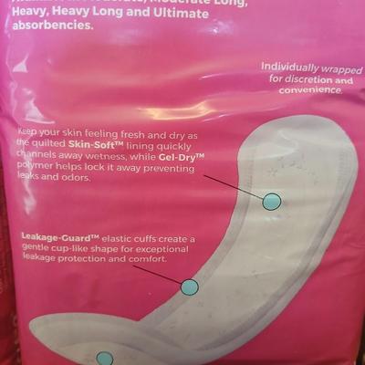 Brand new box of four 33 count latex free Reassure flex shape pads - 132 total in unopened bags