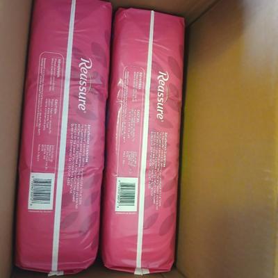 Brand new box of four 33 count latex free Reassure flex shape pads - 132 total in unopened bags