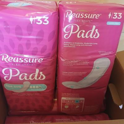Brand new box of four 33 count latex free Reassure flex shape pads - 132 total in unopened bags