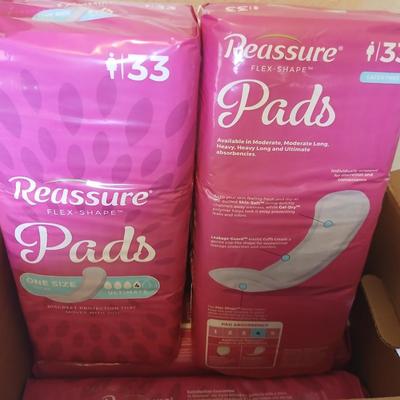 Brand new box of four 33 count latex free Reassure flex shape pads - 132 total in unopened bags