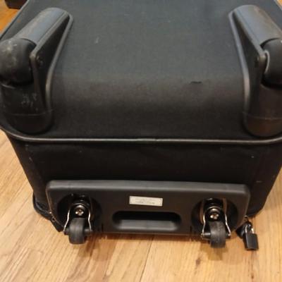 Two suitcases, and several small bags -