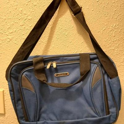 Two suitcases, and several small bags -