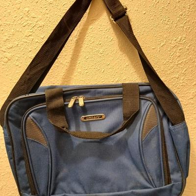 Two suitcases, and several small bags -