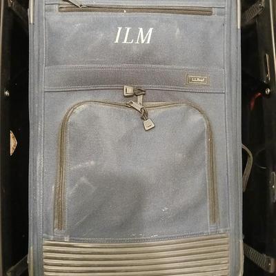Two suitcases, and several small bags -