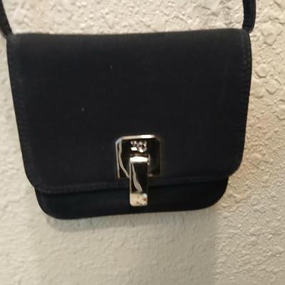 Two suitcases, and several small bags -