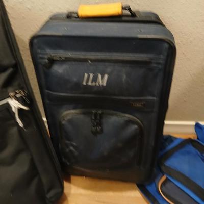 Two suitcases, and several small bags -