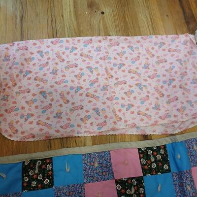 Handmade baby quilt with vintage baby blanket with stitched edging