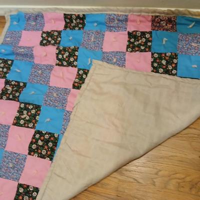 Handmade baby quilt with vintage baby blanket with stitched edging