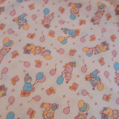 Handmade baby quilt with vintage baby blanket with stitched edging