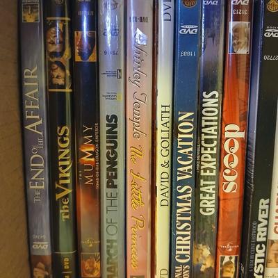Brand new DVD/CD/CDR/CDRW/JPEG player with several DVD movies
