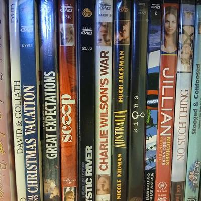 Brand new DVD/CD/CDR/CDRW/JPEG player with several DVD movies