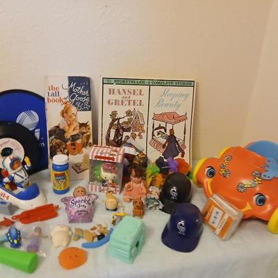Grandkid's toybox - includes 1969 Mattel baby go bye bye bumpity car records, dolls, bubbles, and a great selection of new and...