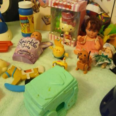 Grandkid's toybox - includes 1969 Mattel baby go bye bye bumpity car records, dolls, bubbles, and a great selection of new and...