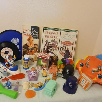 Grandkid's toybox - includes 1969 Mattel baby go bye bye bumpity car records, dolls, bubbles, and a great selection of new and...
