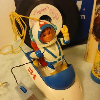 Grandkid's toybox - includes 1969 Mattel baby go bye bye bumpity car records, dolls, bubbles, and a great selection of new and...