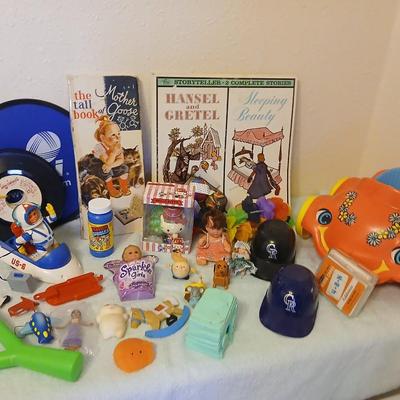 Grandkid's toybox - includes 1969 Mattel baby go bye bye bumpity car records, dolls, bubbles, and a great selection of new and...